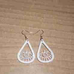 Ethnic eye drop earrings