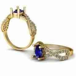 Gold Infinity Ring with Blue Sapphire