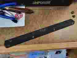 RV baggage door latch spacer