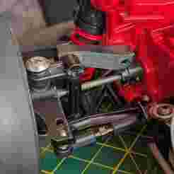 Tamiya TA02 front upper suspension arm with negative camber
